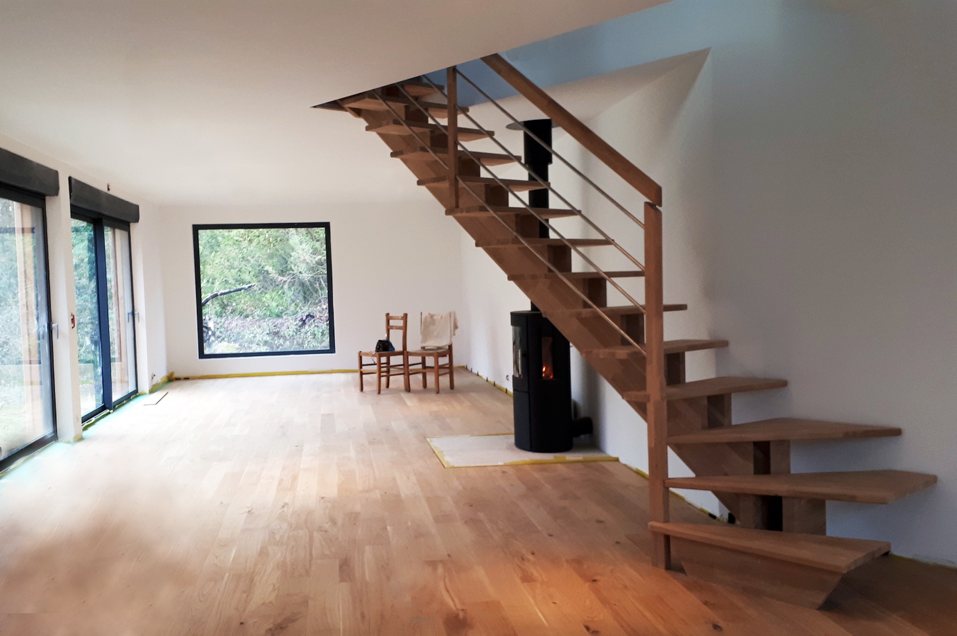 Escalier sur mesure en bois à doubles limons centrés en bois de Forme : escalier Quart tournant à gauche